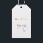 Trendy White Ribbon Wedding Thank You Gift Tags<br><div class="desc">This pretty little wedding Thank You gift tag features a lovely white watercolor ribbon alongside a contemporary font in a chic and trendy faux golden colour,  against a crisp white background,  both front and back. The back includes optional text for a special message.</div>