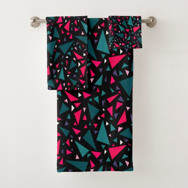 Triangles blue scarlet colours on black background bath towel set (Insitu)