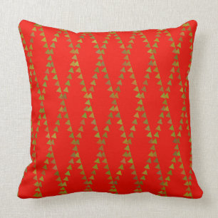 Triangles vertes sur le coussin rouge