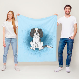 Tricolor Cavalier King Charles Spaniel Dog On Blue Fleece Blanket