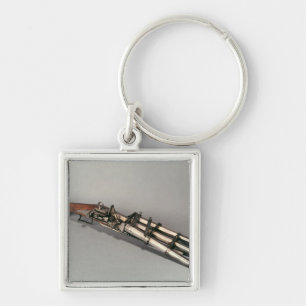 Triple-barrelled pistol keychain