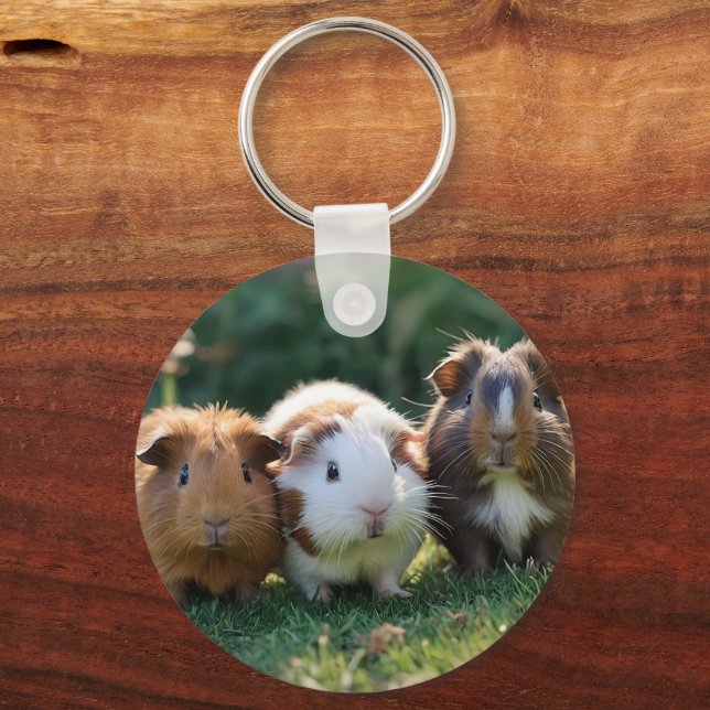 "Triple Squeak: Trio of Adorable Baby Guinea Pigs Keychain (Back)