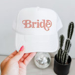 TRIXIE Retro 70's Themed Blush and Orange Bride Trucker Hat<br><div class="desc">This bride bachelorette trucker hat features a retro 70's themed font in blush and orange colouring. Order the white bride option for the bride-to-be and the coordinating orange 'babe' hats for your bachelorette group. Colours are editable! Click 'edit design' to create your own colours.</div>