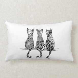 Trois chats dans un Coussin de ligne dans une conc