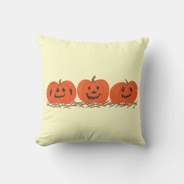 Trois citrouilles heureux dans le coussin de (Recto)
