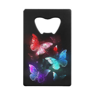 Trois papillons brillants sur l'arrière - plan de 