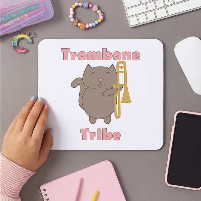 Trombone Tribe Kawaii Cat Pink Letters Mouse Pad (A mouse pad with a cute cat holding a trombone and the words trombone tribe in pink.)