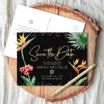 Tropical Bat Mitzvah Save Date Black Gold Floral Invitation Postcard<br><div class="desc">Make sure all your friends and relatives will be able to celebrate your daughter’s milestone Bat Mitzvah! Send out this chic, personalized “Save the Date” announcement postcard. Stylish, stunning, colourful, tropical watercolor birds of paradise flowers, faux gold handwritten script, Star of David and glitter dots, along with modern sans serif...</div>