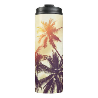 Tropical beach background with palm trees silhouet thermal tumbler