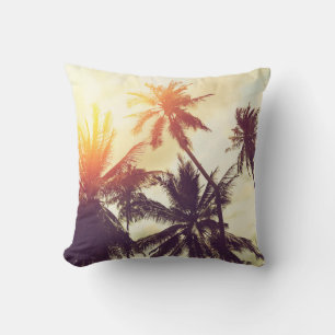 Tropical beach background with palm trees silhouet throw pillow