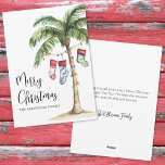 Tropical Beach Christmas Holiday Card<br><div class="desc">Get into the holiday spirit with this festive watercolor Christmas card featuring a large palm tree wrapped in colourful Christmas lights. Three holiday stockings hang playfully from the fronds, while soft beach sand rests at the base—bringing a warm and tropical twist to your holiday greetings. The artwork has a relaxed,...</div>