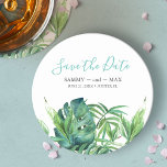 Tropical Beach Destination Wedding Save the Date Round Paper Coaster<br><div class="desc">Announce your engagement in style with these save the date coasters, perfect for destination weddings and modern tropical wedding ideas. Featuring a trendy script typography that mimics hand lettering, this design combines elegance with a touch of boho charm. The coasters showcase a replica of my original watercolor artwork, featuring lush...</div>