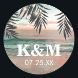 Tropical Beach Wedding | String of Lights Monogram Classic Round Sticker<br><div class="desc">Beach destination monogram stickers featuring a tropical palm beach setting, string twinkle lights, and a modern text template. Click on the “Customize it” button for further personalization of this template. You will be able to modify all text, including the style, colours, and sizes. You will find matching items further down...</div>
