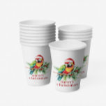 Tropical Christmas Bird Retro Merry Christmas Paper Cups<br><div class="desc">This tropical theme Christmas paper cup design features a tropical bird with a Santa hat holiday greenery and red retro Merry Christmas typography.
Get cozy this holiday season with this mug full of your favourite beverage.</div>