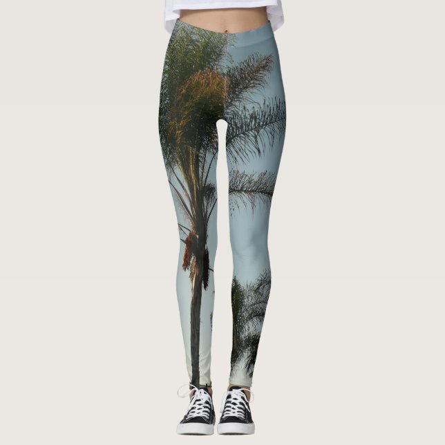 tropical  date palm trees against azure sky leggings (Front)