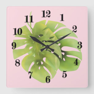 Tropical exotic green monstera leaves watercolor e square wall clock