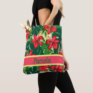 Tropical flowers and leaves tote bag