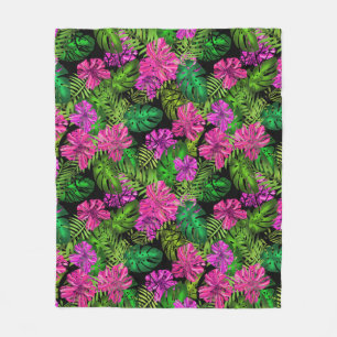 Tropical flowers and plants on black fleece blanket