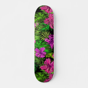 Tropical flowers and plants on black skateboard