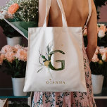 Tropical Foliage Monogram Letter “G" Personalized Tote Bag<br><div class="desc">Personalized tropical leaves monogram letter “G” with faux gold accents tote bag. Please click Customize link to change font,  size,  and colour.   >>> Check out the entire collection (Link below) https://www.zazzle.com/collections/tropical_foliage_monogram_tote_bags_coffee_mugs-119635332640853209</div>