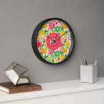 Tropical Fruit Monogram Watercolor Summer Pattern Clock<br><div class="desc">The Tropical Fruit Monogram Watercolor Summer Pattern Clock brings a vibrant and personalized touch to your space. Featuring a colourful watercolor design of tropical fruits, this clock combines style with functionality. The monogram adds a unique, custom element, making it a perfect addition to your kitchen, living room, or office. With...</div>