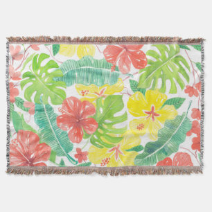 Tropical garden, hibiscus plumeria and palm leaves throw blanket