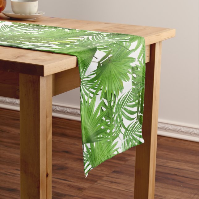 Tropical green palm leaves on forest green medium table runner (In Situ)