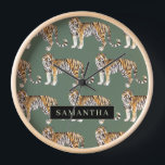 Tropical Green Watercolor Tigers Pattern With Name Clock<br><div class="desc">"Indulge in the wild elegance of nature with our Tropical Green Watercolor Tigers Pattern. Each item featuring this captivating design encapsulates the vibrant spirit of the jungle, blending lush greenery with the majestic presence of tigers. Whether adorning your daily essentials or enhancing your home decor, our collection offers a harmonious...</div>