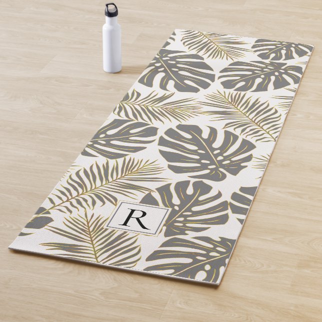 Tropical grey and gold leaves and monogram yoga mat (In Situ)