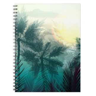 Tropical jungle landscape with palm trees and leaf notebook