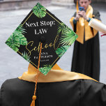 Tropical Law School Graduation Cap Topper<br><div class="desc">Stand out from the crowd at your graduation with our stunning Summer Graduation Cap Topper. With a trendy black backdrop, a splash of tropical watercolor palm leaves, and the bold statement 'Next Stop Law School', this cap is all about YOU. Personalized with your name and class year, show the world...</div>