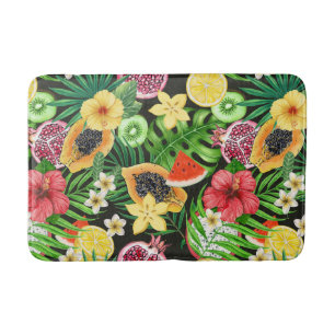 Tropical mix-fruit, flowers and leaves on black bath mat