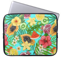 Tropical mix-fruit, flowers and leaves on blue