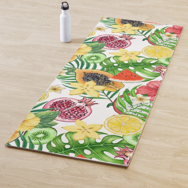 Tropical mix-fruit, flowers and leaves on white yoga mat (In Situ)