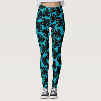 Tropical monstera pattern in black and aqua blue leggings