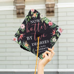 Tropical 'Now Hotter By Two Degrees' Graduate  Graduation Cap Topper<br><div class="desc">Celebrate your academic achievement in style with our trendy girly graduation cap topper. Featuring a vibrant tropical flower design on a sleek black backdrop, this cap topper adds a dash of colour and charm to any graduation outfit. The icing on the cake? The 'Now Hotter by Two Degrees' quote is...</div>
