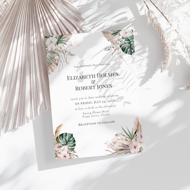 Tropical Orchid and Monstera Wedding Invitation (Tropical Orchid and Monstera Wedding Invitation on a sunny white table with dry white palm leaf.)