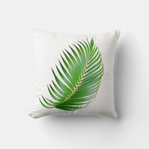 Tropical palm green leaf on white throw pillow