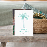 Tropical Palm Seas and Greetings Christmas Photo Holiday Card<br><div class="desc">Send your Christmas greetings this season with this modern teal,  white and grey holiday design featuring elegant typography and a tropical palm tree with the words "Seas & Greetings" on the front and your favourite photo on the back of the card.</div>