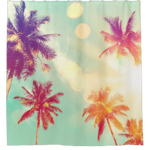 Tropical palm tree with colorful bokeh sun light o