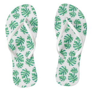 Tropical pattern with monstera leaves flip flops