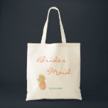 Tropical pineapple beach wedding peachy bridesmaid tote bag<br><div class="desc">Whimsical modern beach wedding bridesmaid tote bag with tropical peachy pink and faux gold glitter pineapple. Perfect choice for a modern beach,  sea,  oceanfront,  coastal,  tropical,  nautical or destination aloha themed wedding. Personalize it with your title and name!</div>