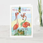 Tropical Pineapple Pink Flamingo Christmas Holiday Card<br><div class="desc">Beautiful pink flamingo Christmas cards that you can personalize for the holiday season! Friends and family will love these artistic, unique tropical Christmas cards... This original design by Raphaela Wilson, depicts 2 pink flamingos wearing a festive Santa hat and reindeer antlers with a bag of golden pineapples against a watercolor...</div>