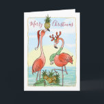 Tropical Pineapple Pink Flamingo Christmas Holiday Card<br><div class="desc">Beautiful pink flamingo Christmas cards that you can personalize for the holiday season! Friends and family will love these artistic, unique tropical Christmas cards... This original design by Raphaela Wilson, depicts 2 pink flamingos wearing a festive Santa hat and reindeer antlers with a bag of golden pineapples against a watercolor...</div>