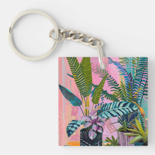 Tropical pink flamingos set against lush green keychain
