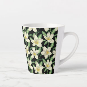 Tropical seamless pattern white flowers green leaf latte mug