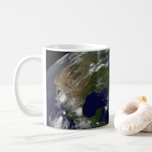 Tropical Storms On Planet Earth. Coffee Mug (With Donut)