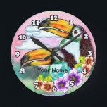 Tropical Toucans  Round Clock<br><div class="desc">Tropical Toucans clock by ArtMuvz Illustration. Matching toucans apparel and beach gifts. To personalize  add your name or add text instead. Customize this  Toucan clock to make it uniquely yours or to give as a personalized gift</div>