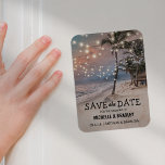 Tropical Vintage Beach Lights Fridge Save the Date Magnet<br><div class="desc">Vintage beach destination wedding save the date magnet featuring a romantic sunset tropical beach setting with lush palm trees and string twinkle lights. For further personalization, please click the "Customize it" button to modify this template. All text style, colours, and sizes can be modified to suit your needs. You will...</div>