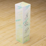 Tropical Watercolor Monogrammed Wedding Wine Box<br><div class="desc">Romantic splash of soft pink, green, yellow, blue tropical watercolor wash Wedding Favour Wine Boxes. All over print is lovely for your reception favour gifts for wine or champagne bottles tucked inside, or for anniversary or other special occasions. Personalize with the Bride and Grooms First Name Initials and Wedding Date...</div>